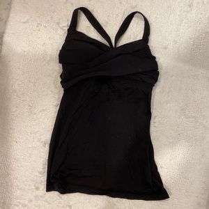 Lululemom size 4 open back top with built in bra black.